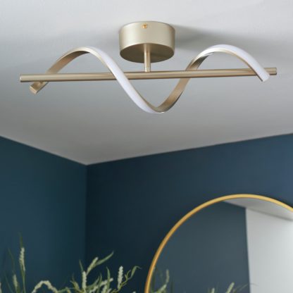 5a2193cb9f1c773d3ea82afaba17494b79a866209b2c735ec92f93aaa42d1bdf.jpg An Image of Shore Light Caliso Metal LED Flush to Ceiling Light - Gold