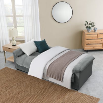 62d31c9b7a2d6e095a1d8c51eb30614854de8d7c1c77e437752de909dc2f03a0.jpg An Image of Margo Velvet Sofa Bed With Storage Black