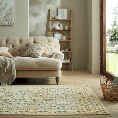 An Image of Torres Global Washable Rug Cream