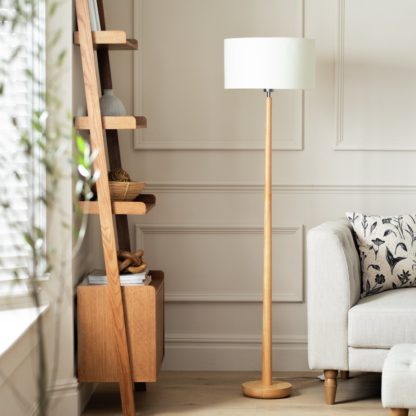 97d933ae4c28a840f80653a4df0c3e279dfc4fcc6fea84bb5c35b64a77416ebc.jpg An Image of Habitat Rubber Wood Tapered Floor Lamp - Natural
