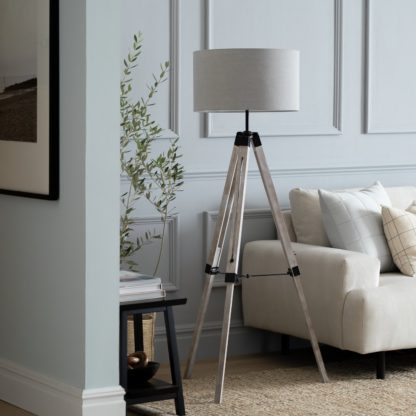 An Image of Habitat Rubber Wood Tripod Floor Lamp - Natural & Cream