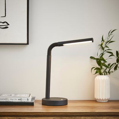 c70f929839ec9c5a916febe7115c580cb457dae4fd95978b04f1eff82433d072.jpg An Image of Modern Metal Rechargeable Touch Table Lamp White