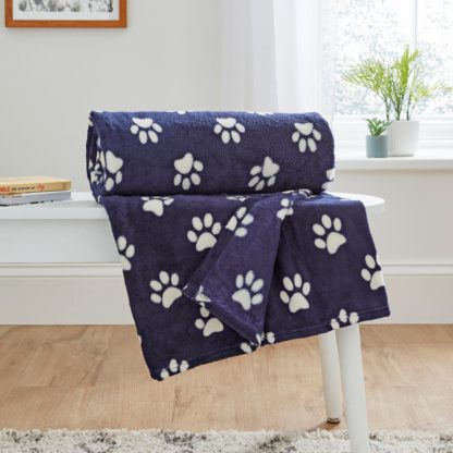 An Image of Printed Paw Print Throw Ochre