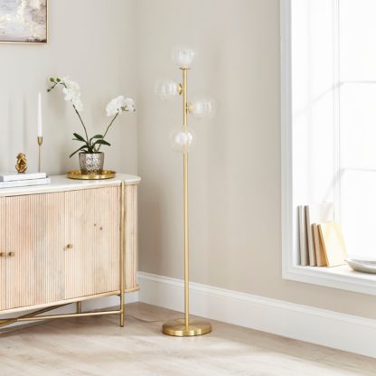 An Image of Leirah Ribbed 4 Light Floor Lamp Gold