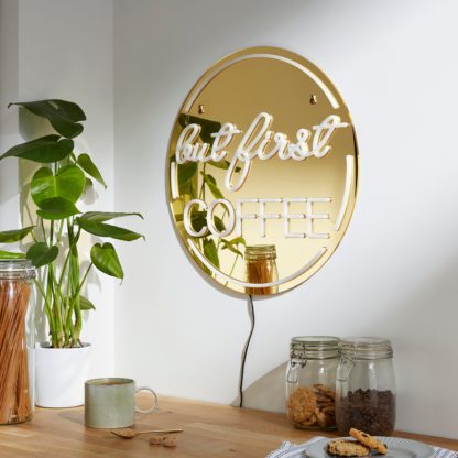 An Image of 'But First Coffee' Indoor Outdoor Mirrored Neon Sign Gold