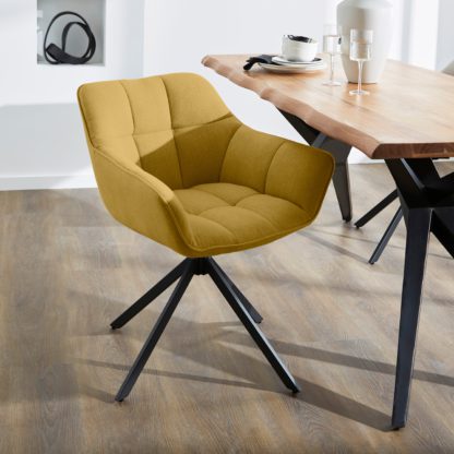 0f0b75623daf850696e5c37b58c4cf125bffb16db4be8573d0d779ffcb7b0af8.jpg An Image of Henson Swivel Fabric Dining Chair Natural
