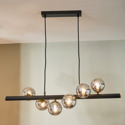 An Image of Blair Smoke Glass Ball and Black Metal Diner Ceiling Fitting Black