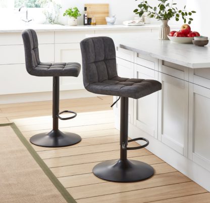 0b37b5010291b4bde5ffed44745306a2f21576fc46e413141046d04494c40039.jpg An Image of Jasmine Adjustable Height Swivel Bar Stool, White
