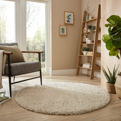 4c151e3fad2328a44b893914bb146648b65a67fc3e84129fb6cd1c788d151e7a.jpg An Image of Cloud Washable Shaggy Round Rug Sandstone