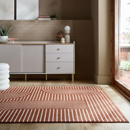 69e7bc57bfd16dbbfa1956f67bcd5d4d7b20047c80c1c4b58f572c322114b6c2.jpg An Image of Geometric Abstract Swirl Rug Olive