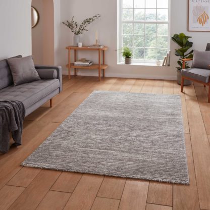 a66f8606c961adf9e499733c62e6dee112b104ff68c9edfb7d49530a43ab29e4.jpg An Image of Flores Ribbed Washable Rug Charcoal