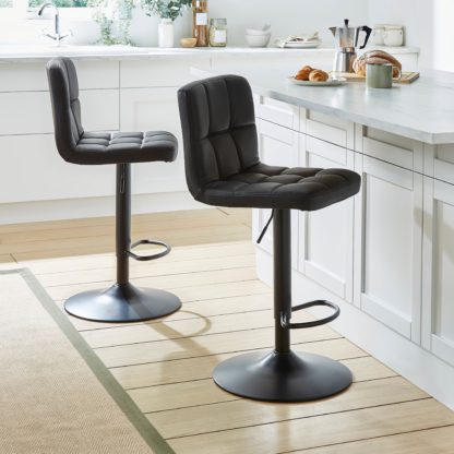 a924f68be2c03029a10faec90cfa7a3eb908ac67c924ac58174b26388c02325a.jpg An Image of Jasmine Adjustable Height Swivel Bar Stool, White
