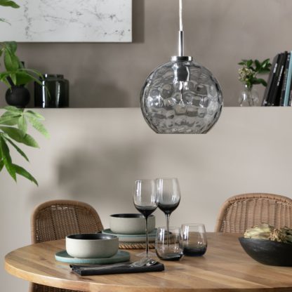afd4618799f306c556ddf31d634b5bad81b2bd237d621920025116fc2a093f99.jpg An Image of Habitat Luxe Glass Pendant Light - Chrome