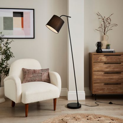 An Image of Leaner Metal Floor Lamp Black