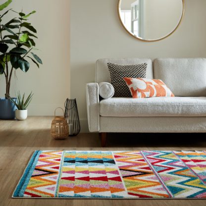 1af2576a4813c4af5da83cad74754d87f393f48712c363b7445ef02cf724e9f8.jpg An Image of Elin Geometric Rug MultiColoured