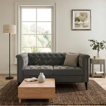 4ee7ee56a07696f313a0b15a782aa31e2917150502b381948ba495df2215d008.jpg An Image of Nellie Velvet Buttoned 2 Seater Sofa Steeple Grey