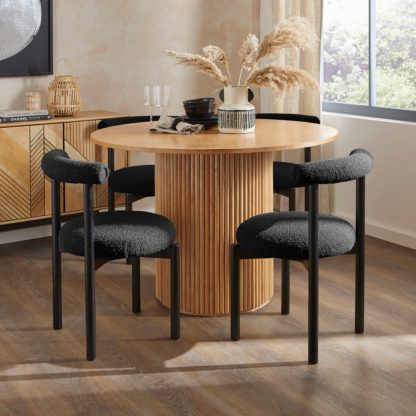 911fb1dc15d1f1d3666ca198a59ab7e4d74d6ab4bf58dfe540a1f069c8c27921.jpg An Image of Violeta Dining Chair, Boucle Olive