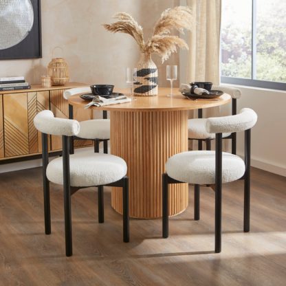 b88581aec5b0ce086d1c9a2a6b5498e6bc3b5aebb2629ab63a2fc22fb4338805.jpg An Image of Violeta Dining Chair, Boucle Olive