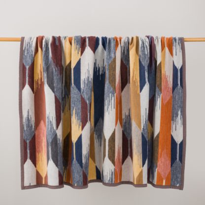 bcea709c5a0d94b2233871bba9e81fdffa94a744ec4f3ab03e58b24015bafedc.jpg An Image of Supersoft Kelso Cotton Blanket MultiColoured