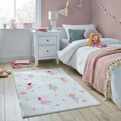 c11f31705f014c683241d8e01db9d332246650cf43aafe40c1d1028512416c7f.jpg An Image of Meadow Fairies Washable Faux Fur Rug MultiColoured