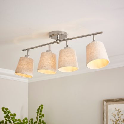 6e9a3b9fc1c72db103f2f460e9418f3e03bafe308d26f01367b3c3feead2f1a1.jpg An Image of Preston 4 Light Adjustable Spotlight Bar Natural