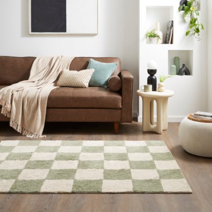 a75002ebe4a52ffc43094696170ddf88fce55dd0c9d8879c6ed3de7cfc3814a4.jpg An Image of Vintage Checkerboard Rug Sage