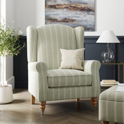 066db81dd7aa37c5ecea987ae4295516a69c7391ac0347f86c5557f46a36704a.jpg An Image of Oswald Folkstone Stripe Grande Armchair