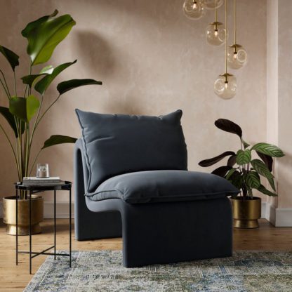 0f0c6ebc7076d4319bd87f2454abe4dc1b09e42db505eb6b3b43f4729a3d52ba.jpg An Image of Rayner Velvet Accent Chair