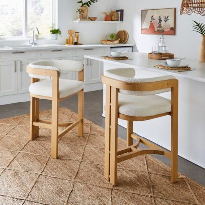 171f0345cbbe4b03367d16cfc5130074ff0de6658625b23b64b00b925e760aeb.jpg An Image of Lovato Barstool, Boucle