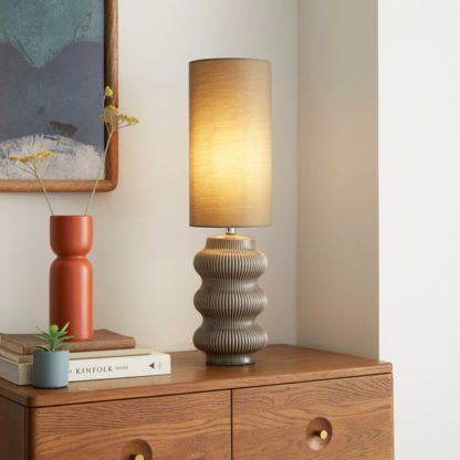 1ca285648074a52e6d617a1993efb8588655c135b6f1ba851dbeb6d5e6b742b4.jpg An Image of Pippin Ribbed Ceramic Table Lamp