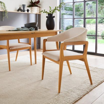 28a171e8be37fbeff909b2d3c519fc130a7804bb03dbfd741fd08a290cb0119c.jpg An Image of Hugh Dining Chair, Velvet