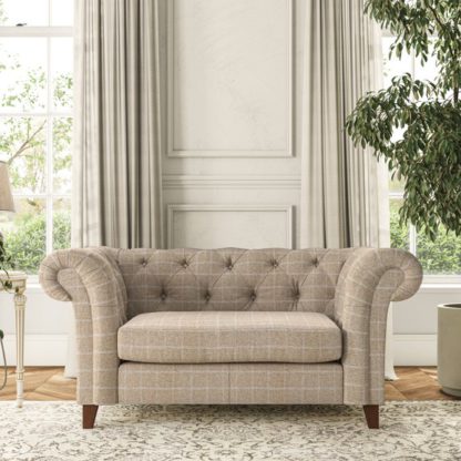 37c6f00c77da57f2f20c0c6aad38251d52efac9c171624e10f8233f0625415f7.jpg An Image of Pimlico Snuggle Chair