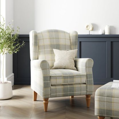 4213e0fb4bcadc80d8b9544e43ef31578a621456baec411bf36b672983b465fe.jpg An Image of Oswald Check Armchair, Green