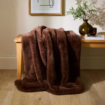 49d368ba2034ab3adfa6d98f5a76d2aee1995663ba51341a3cad88ceb181b4c3.jpg An Image of Silky Soft Faux Fur Throw Blush