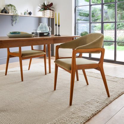 49f7a878683a37235bcba7f7c723b43ece924fd8d518399955a4a129a59b4968.jpg An Image of Hugh Dining Chair, Velvet
