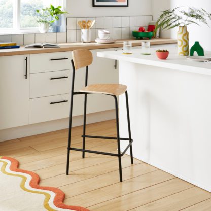 57adfde25358a4b47c1318c579efe45a672d2e89fd8a837395ca65b713f4d235.jpg An Image of Elements Griffin Counter Height Bar Stool Black