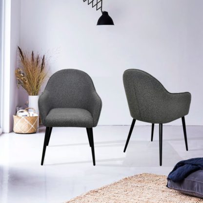 60a60c2b40ab996a74a5a4b9da0a20f7cd02000aec3fedd88ee6e70b40f16fd4.jpg An Image of Indus Valley Set of 2 Boucle Dining Chairs