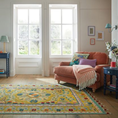 6505ed19c9d9eb5342d24f74cf791bdc1c954990d3f5ebbecaf70e47c7ce721e.jpg An Image of Rani Embroidered Floral Rug