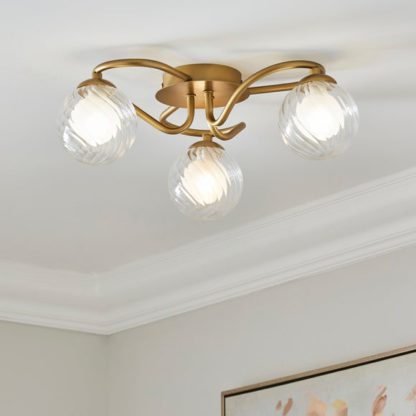 77e9dcc5b51a97e9ca385b746e58086eaeb40ae46bf5a89ea9c9429914452a22.jpg An Image of Selana Semi Flush Ceiling Light