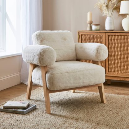 7c882820337a311076ee91ae654819598492fb993668e695afd72a16e2fd98d8.jpg An Image of Brynn Supersoft Faux Fur Accent Chair Ivory