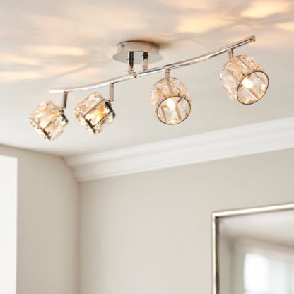 7d8ad8c7f6c3bcfc78a3fdb8b44454bdf4bd264090c69eea118f0963b07bffa7.jpg An Image of Kleio Modern 4 Light Adjustable Spotlight Bar