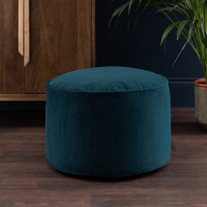 866f2b755f93c1a8190f9ce5ba1d352f41d739e750e157b8d69fd98089076bdd.jpg An Image of Eliza Velvet Pouffe