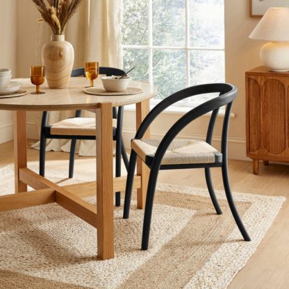 8a3d8a8d930c6912d81d362d0b58d5eba74aa9e0b547f4eff883348e6885c154.jpg An Image of Nancy Dining Chair