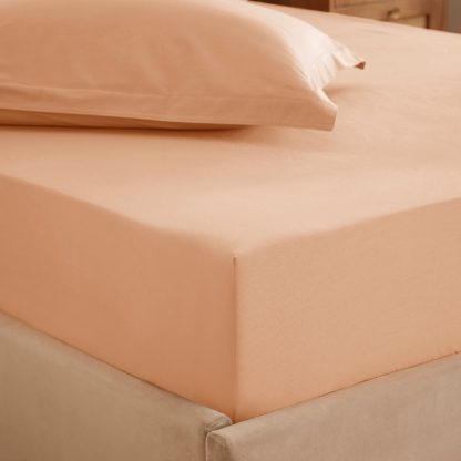 8d1fb12cebc53f66610463c331ffc7073d87c1f7d4834bf09e4d2794fe059ad6.jpg An Image of Soft Washed Recycled Cotton Fitted Sheet Rhubarb