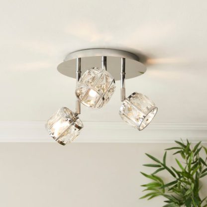 9ced8d664ec907c8e7e3a5a5eb8b3d58abfe0a08964f193b938e33e95512c6f9.jpg An Image of Kleio Modern 3 Light Adjustable Spotlight