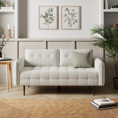 bb521cd414f49c8993e2e4f1fd5866340031e25e6e40e236ad4133da3fd74ac0.jpg An Image of Sadie Quilted Chunky Soft Chenille 3 Seater Sofa