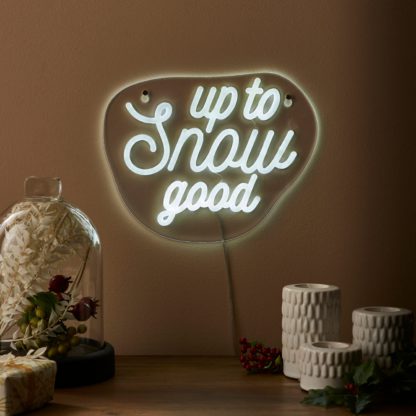 c71818e8cd5f5729dad586a5908c533ee75239640d658ed051690719336f8393.jpg An Image of Up to Snow Good Neon Sign White