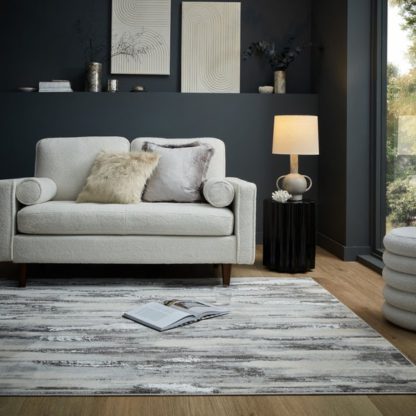 d9dbb0ce1e2358657aae6bf4ce599d1d6d7d0d8c2bf7984eb5388be18fb73685.jpg An Image of Gleam Abstract Rug