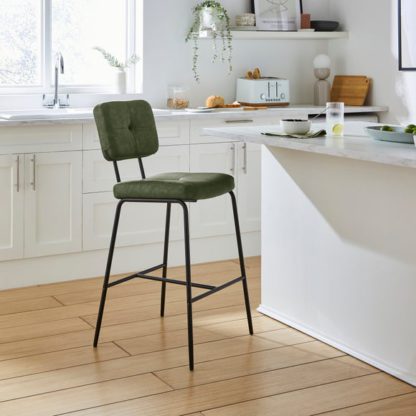 e423077449194445dcec3fdd878a8be17792c085fa4c9cefa944e55d9b1add7f.jpg An Image of Jessie Counter Height Barstool, Faux Leather