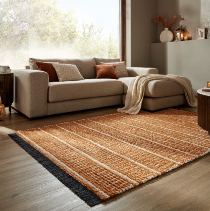efe788863dbd5eccf1b6e0584f823cb09d3c4d07e0943de8f8b643160e1b3fc6.jpg An Image of Ribbed Geometric Striped Shaggy Rug Blue